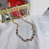 Collar de tela marina tricolor. (Gucci) 