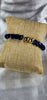 💮Elastic bracelets with round beads of blue onyx and natural white quartz.📿