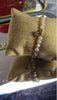 💮Gold-colored metal beaded bracelet set with faux pearls.📿